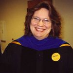 Cindy as a parent at graduation