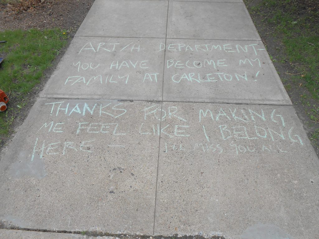 Chalk message: "Thanks for making me feel like I belong here."