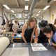 Ruby Mead ‘24, Eunice Gao ‘24, and Miriam Chasnov ‘25 study two stages of a print at the Australian Print Workshop