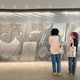 Hannah “Gabs” Ward ‘24 and Sophie Rast ‘24 take in Judy Watson’s etched panels on display at the Melbourne Museum