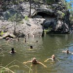 Students join professor Eleanor Jensen ‘01 to cool off from the summer sun with a refreshing dip in the rock pools at Canarvon Gorge