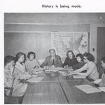 students in a 1950s classroom with a professor