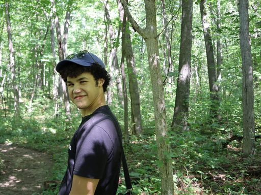 Eliot Klus walking in woods