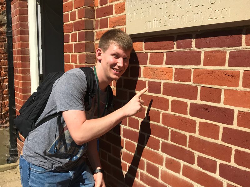 Spencer Lekki '21 at Gressenhall with the brick from the first Workhouse Master, James Moore