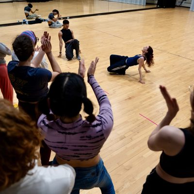 Students are shown dancing and celebrating at Jason Rodriguez Workshop