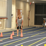 Two people with an egg sprinting to win.