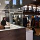 People standing in line at the Sayles Cafe window
