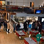 People standing in line at the Sayles Cafe window