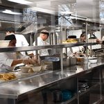 Staff preparing the food for staff.
