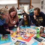 People putting together a puzzle