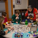 People putting together a puzzle