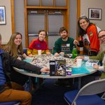 People posing with a Star Wars puzzle