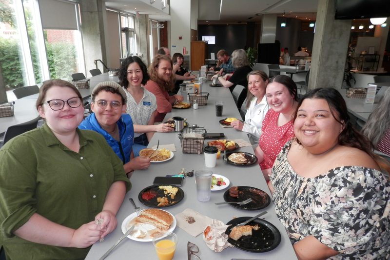 Staff eating breakfast.