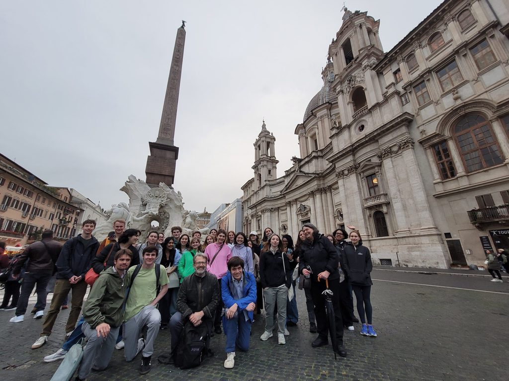 Piazza Navona Rome OCS Spring 2025 students gathered around the Obelisk of the Fontana dei Fiumi