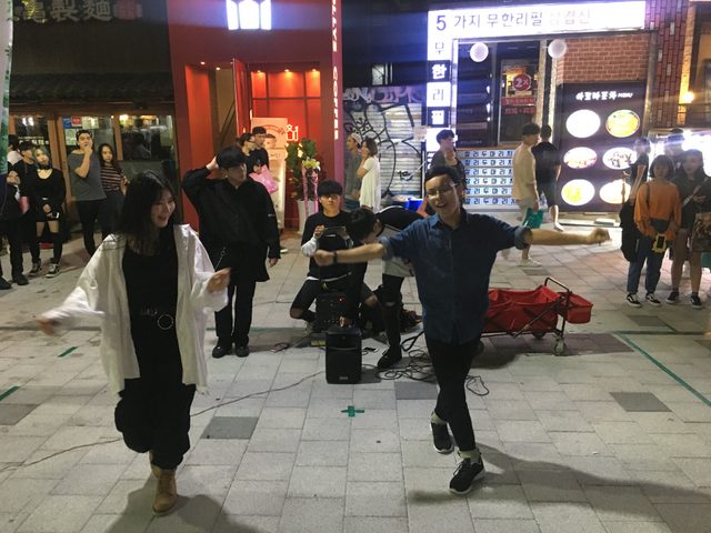 Dancing with buskers in Seoul