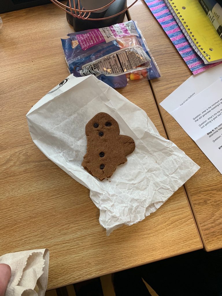 A human-shaped cookie with one arm and both legs bitten off!