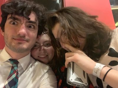 Lucas and a couple of friends in a messy selfie at the Midwinter Ball
