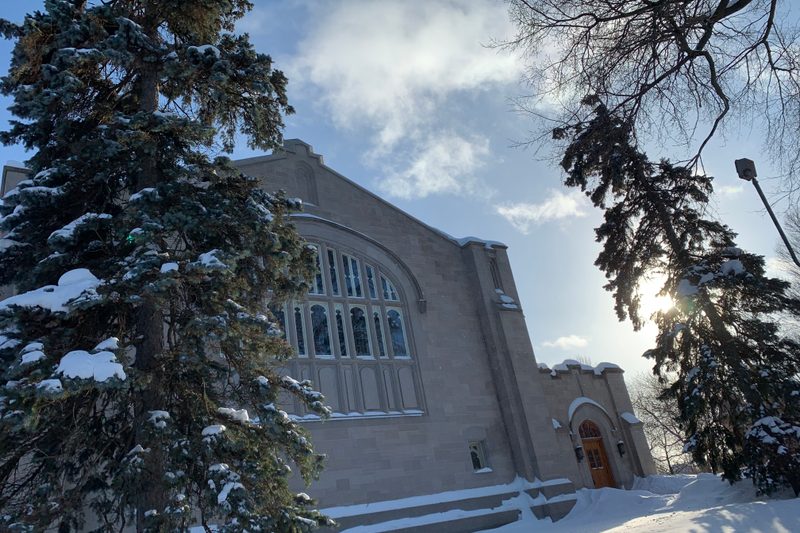 Trees outside of Skinner Memorial Chapel topped with snow