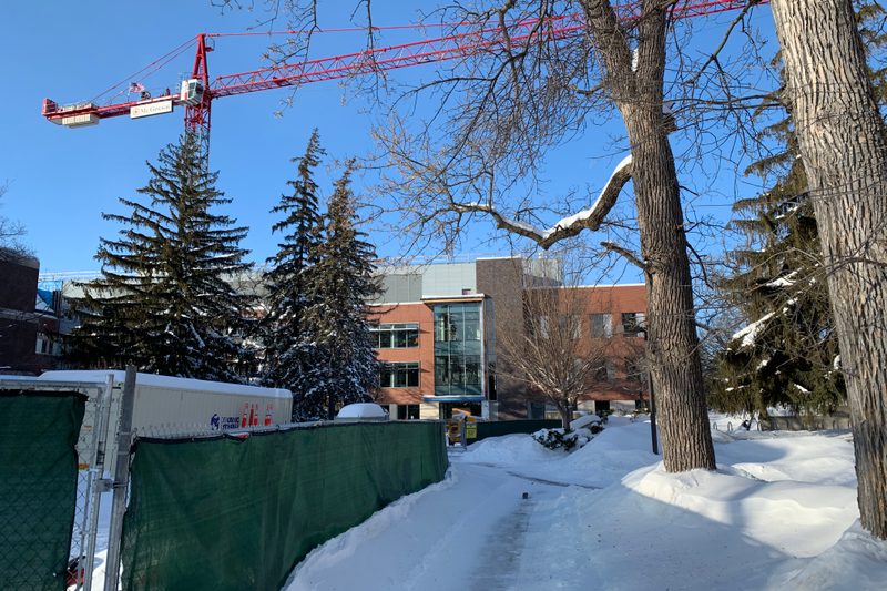 The under-construction Integrated Science Center covered in snow
