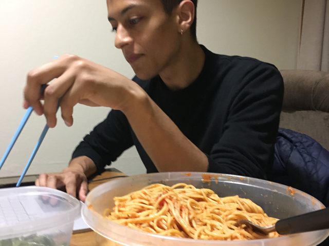 spaghetti bowl and a person with chopstick