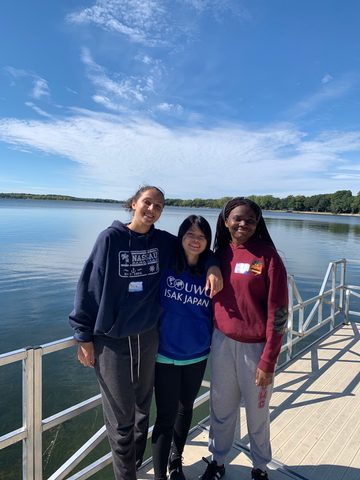 three girls by the lake