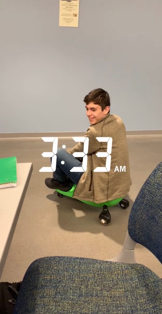 A picture of Lucas' friend Larry scooting on a PlasmaCar at 3:33 am