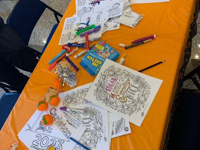 Coloring pages on table.