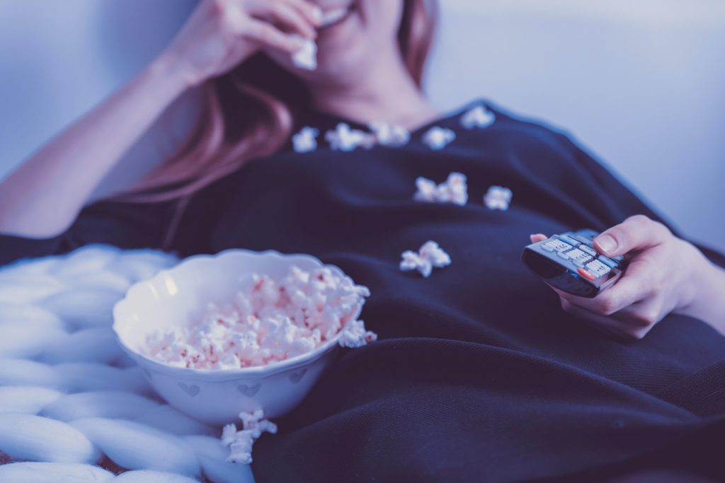 Woman Wearing Black Dress Shirt Eating Popcorn, by JESHOOTS.com from Pexels. Taken At March 17, 2018 4:02 pm