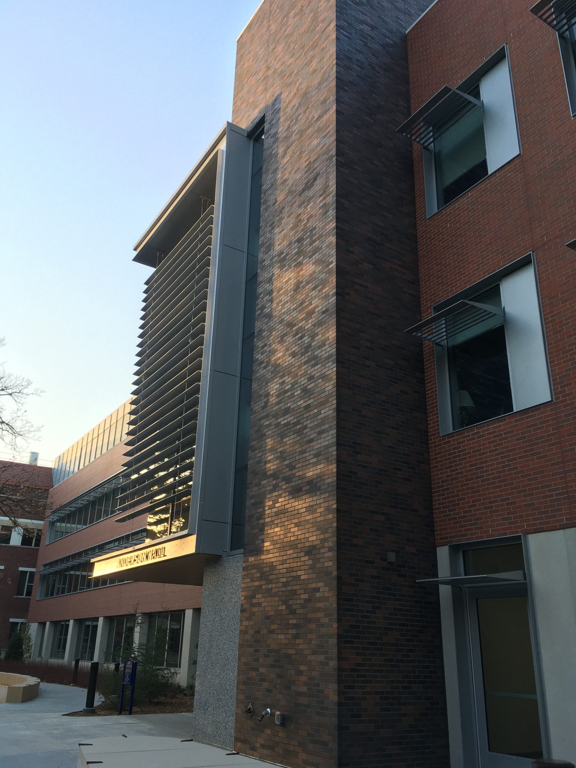 Light reflecting off of the entrance to Evelyn Anderson Hall