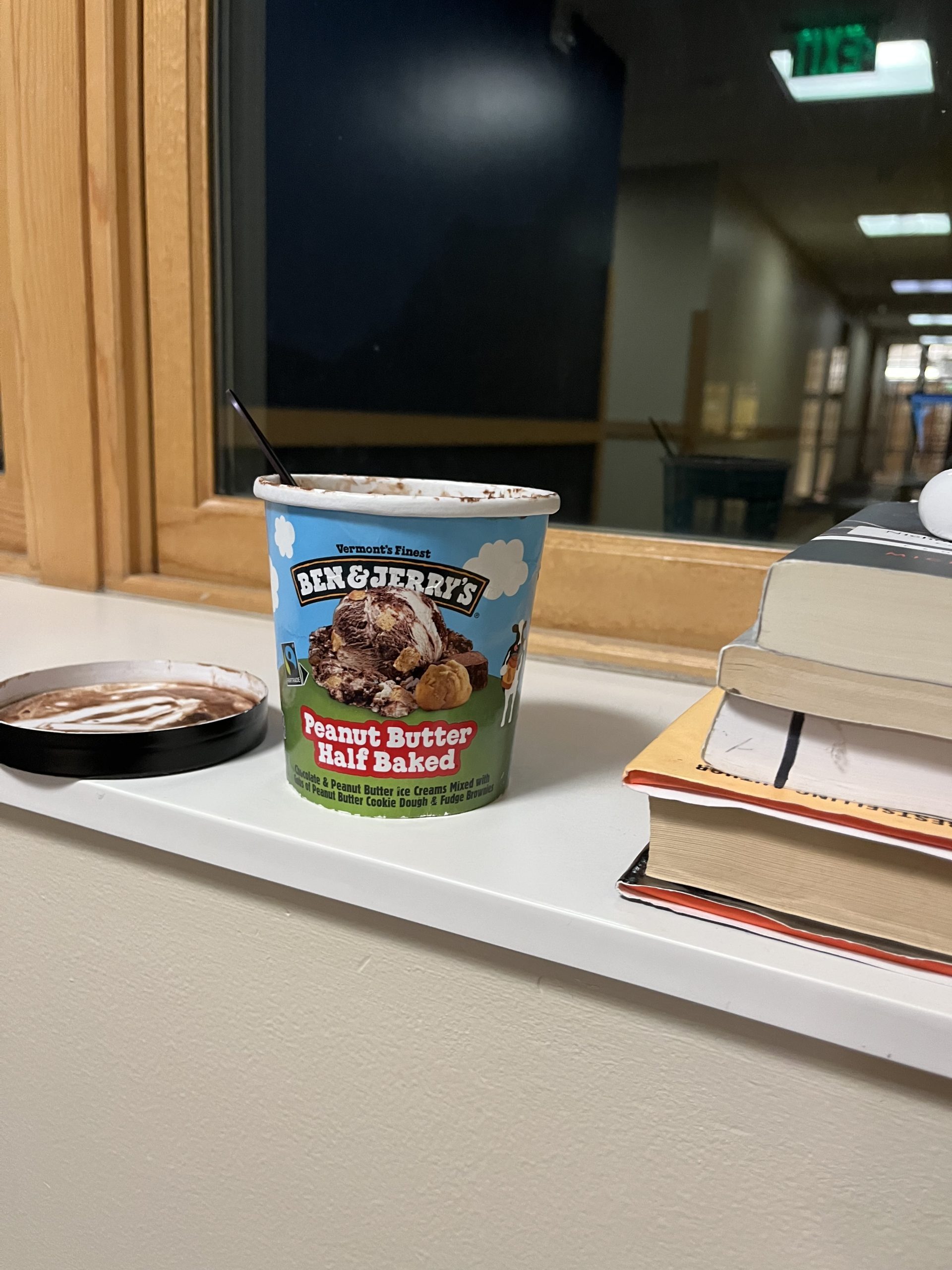 Ice cream stands next to books