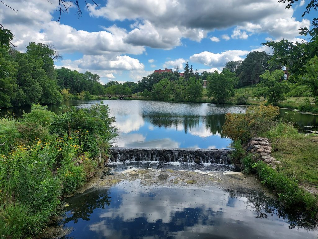 The mini waterfall in arb on an afternoon in summer.
