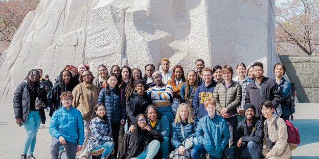 Carleton students in front of the MLK memorial in Washington DC