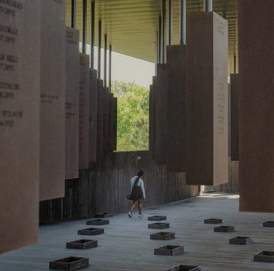 A student walks through the memorial site