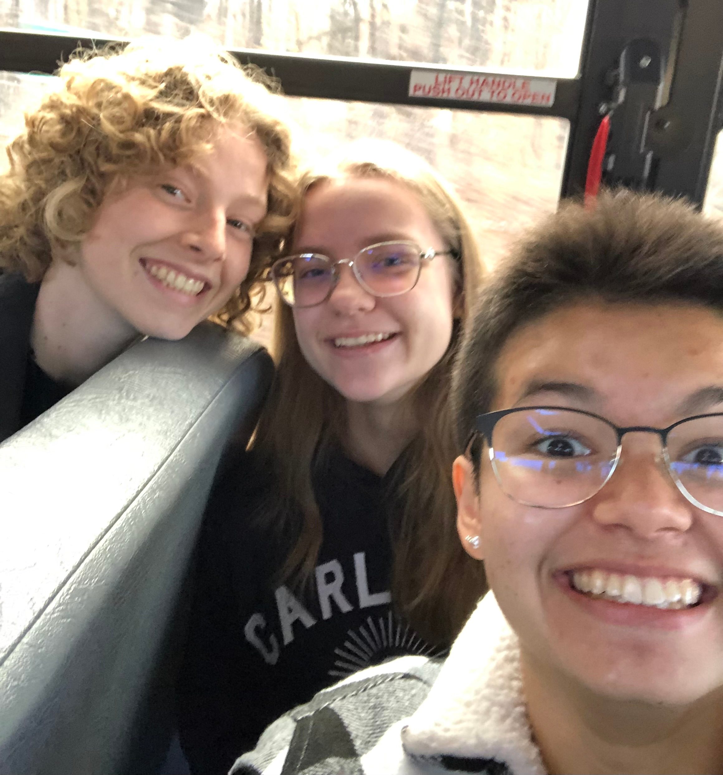 Max, Allie and I on a bus