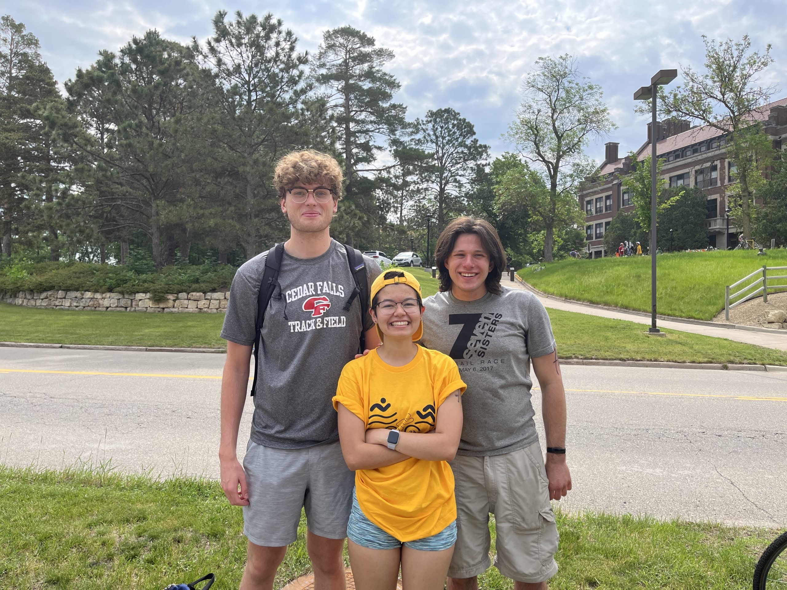 Harrison, Lexi, and Jonah pose before their triathlon