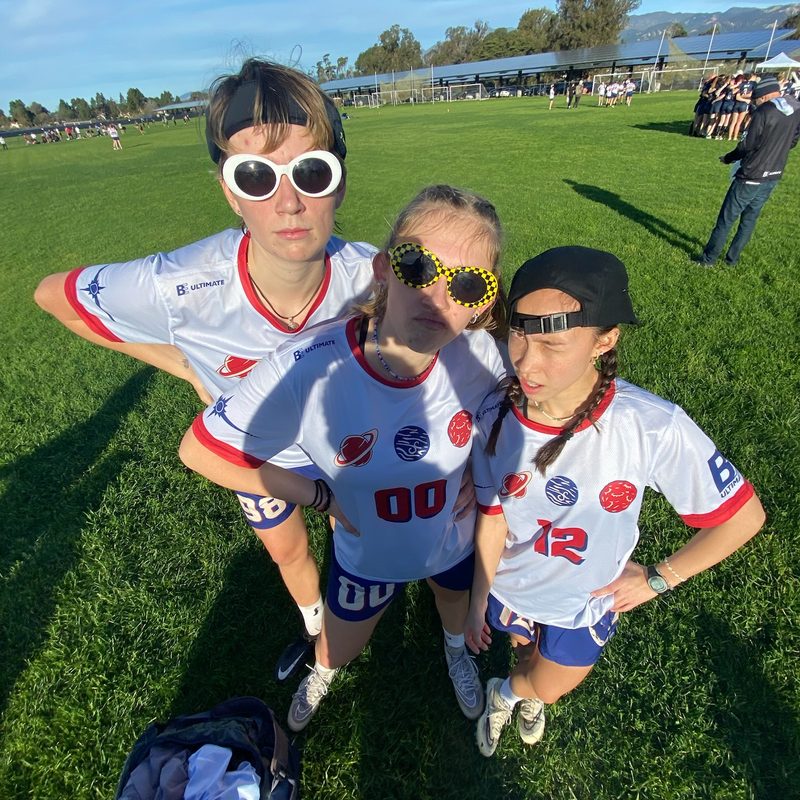 syzygy players stand on the field with sunglasses
