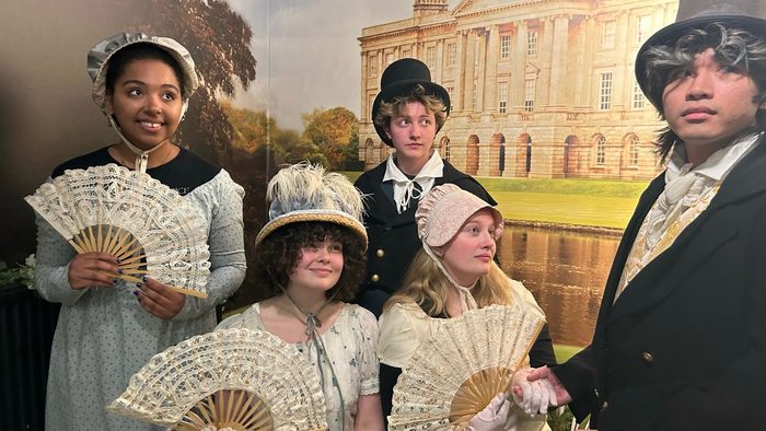 students dressed in regency era clothes