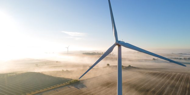 Carleton's wind turbine from a bird's eye view on a foggy day