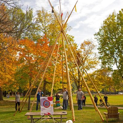 construction of a tipi on Carleton's main greenspace