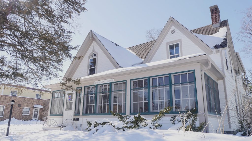 The front of the historic Dacie Moses house in winter.