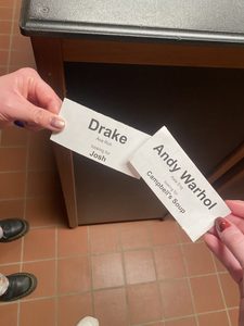 One name tag with Drake and one with Andy Warhol