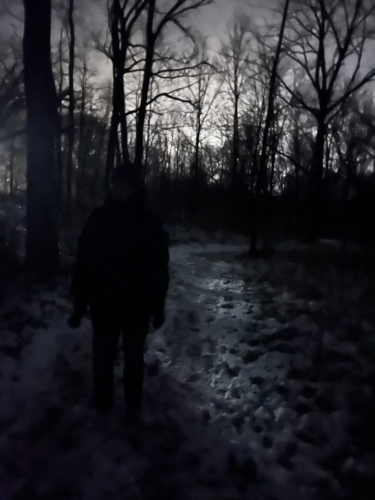 photo of friend at night in the arb