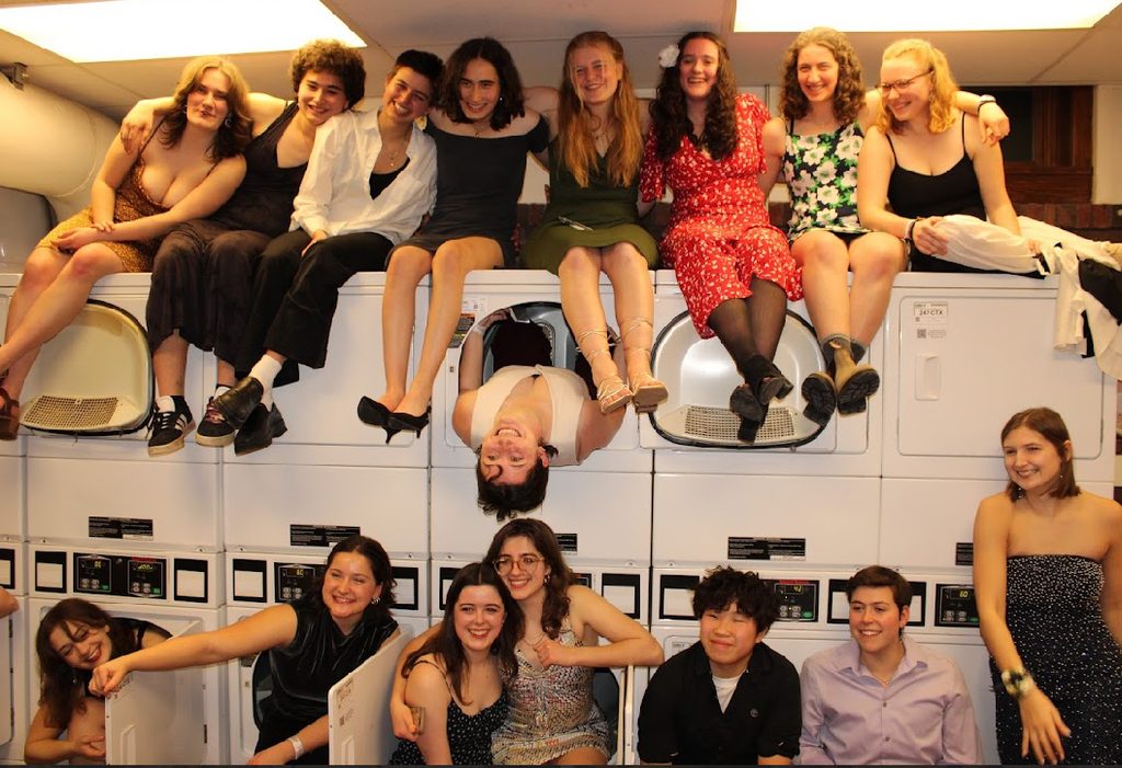 rugby team posing in Burton laundry room