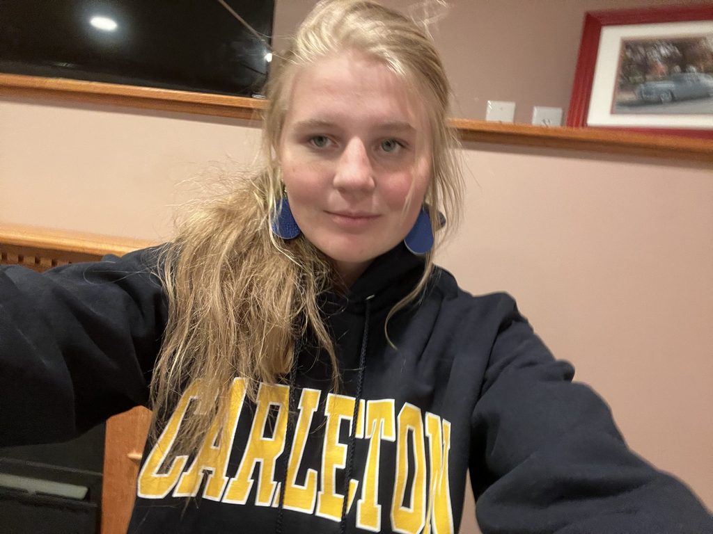 selfie of person in Carleton sweatshirt