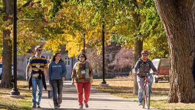 People walking around campus