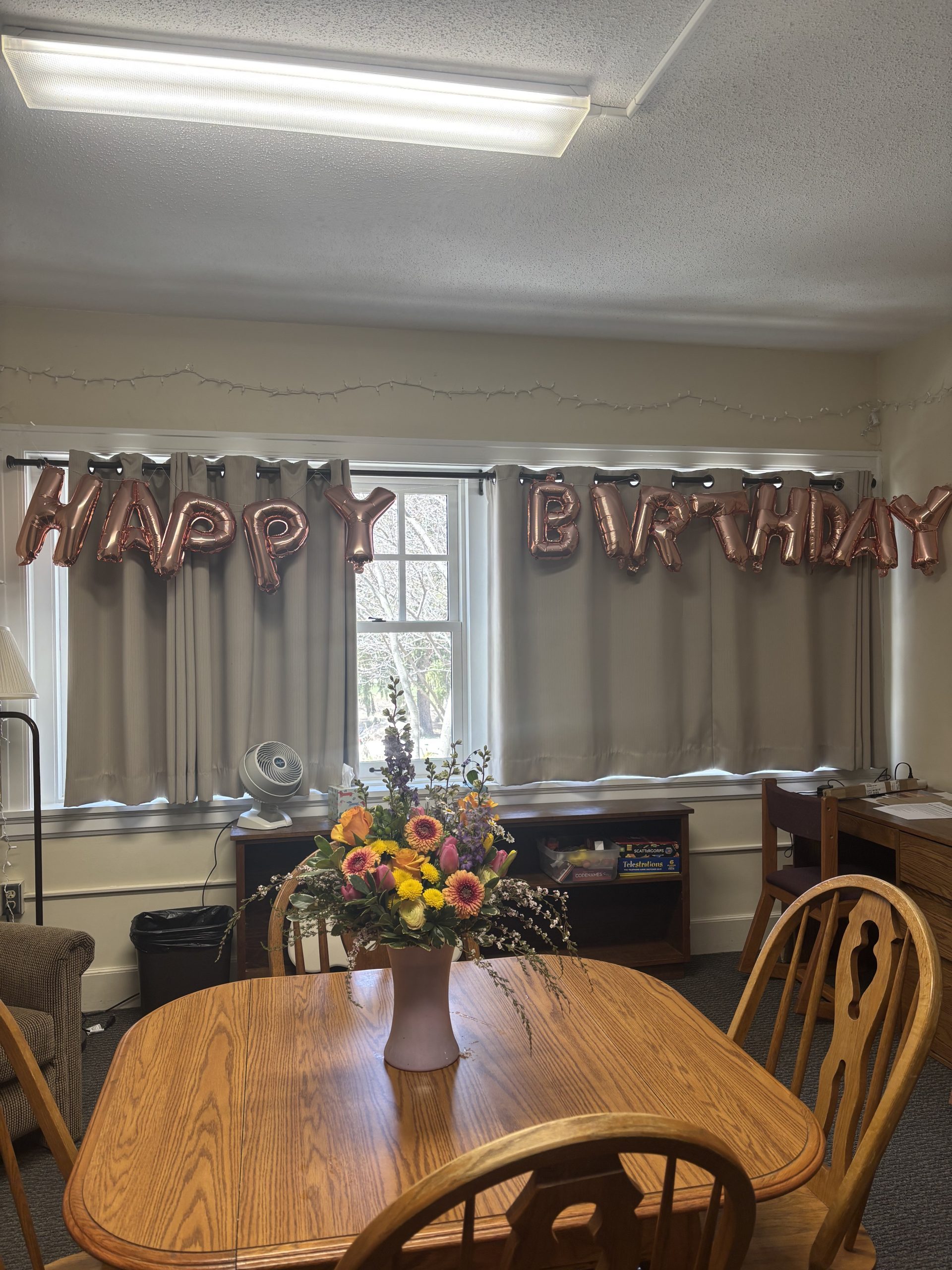 Balloons that spell out "Happy Birthday"