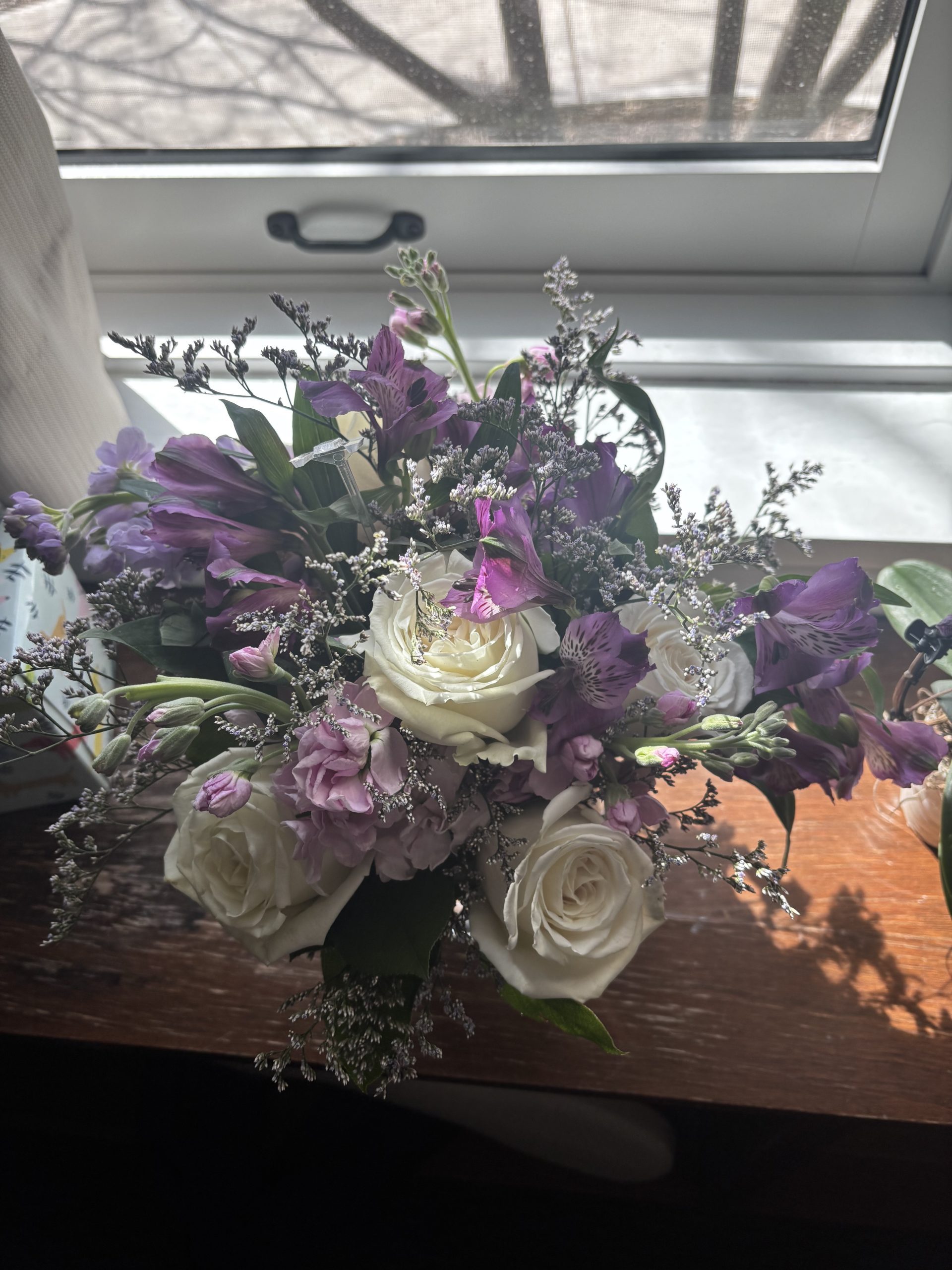 a bouquet of purple flowers