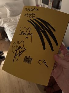 A program with 4 signatures on it