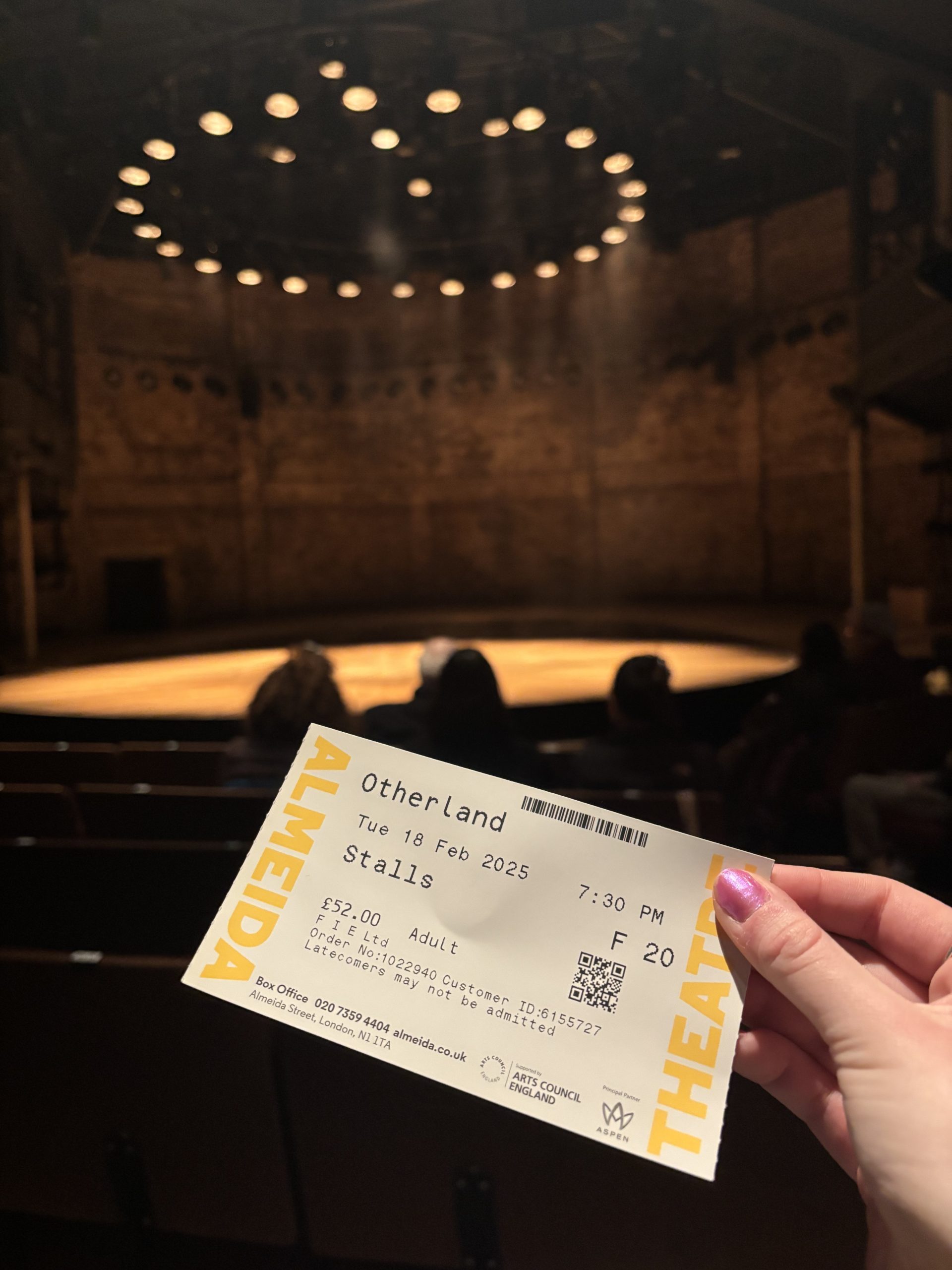 A ticket stub in front of stage