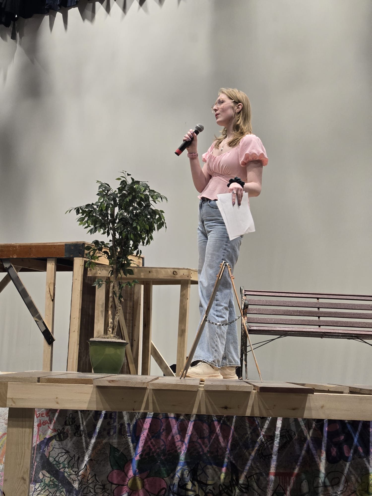 A girl singing into a mic